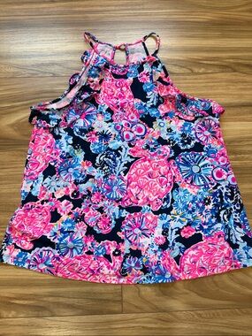 Lilly Pulitzer “Billie” halter top. The pattern is Turtle Amazement Size M. EUC